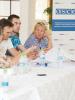 Elena Stepanova from the left bank listens to her colleague’s proposals during a group work exercise, Vadul-lui-Vodă, 2 August 2015. (OSCE/Liubomir Turcanu)