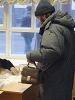 Voters registering at a polling station in Kyiv  during the repeat second round of the presidential election on 26 December 2004. (OSCE)